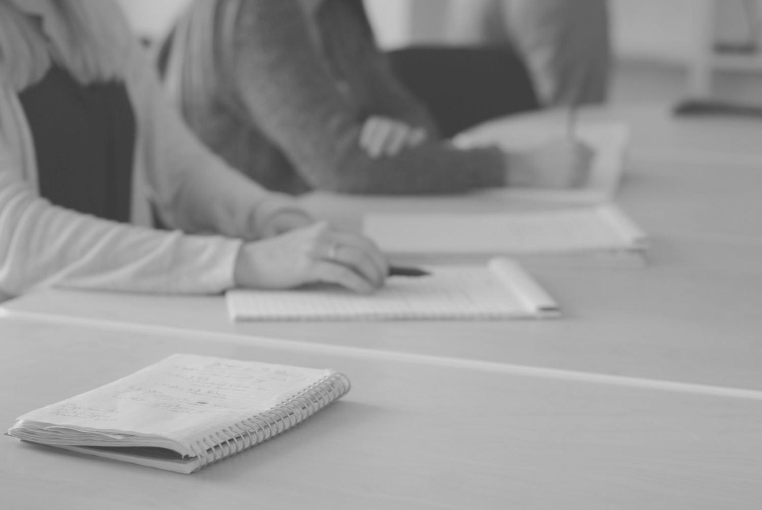 Financial planning workspace with documents and notes